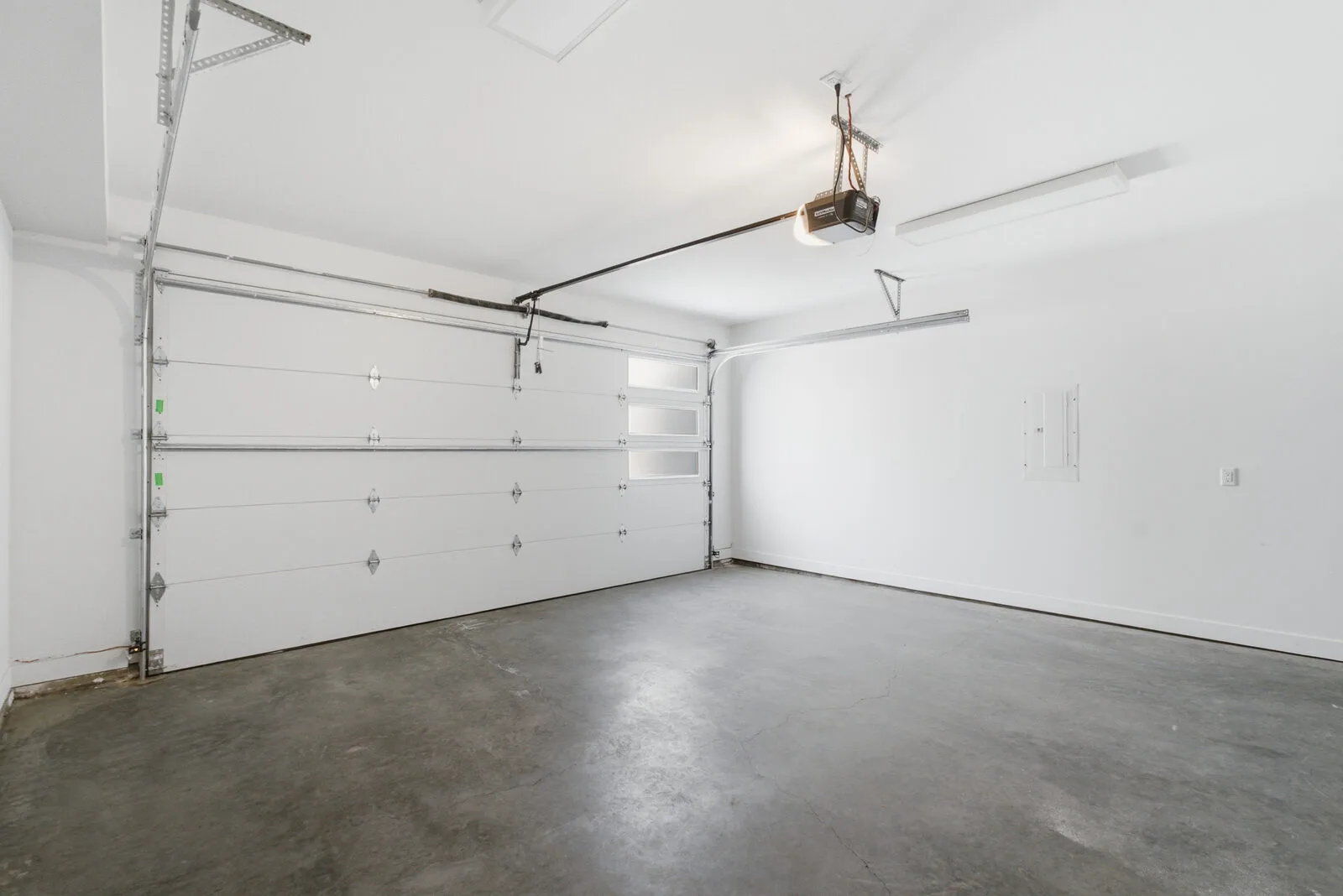 Secure two-car garage with auto entry at an Academy Ridge townhome